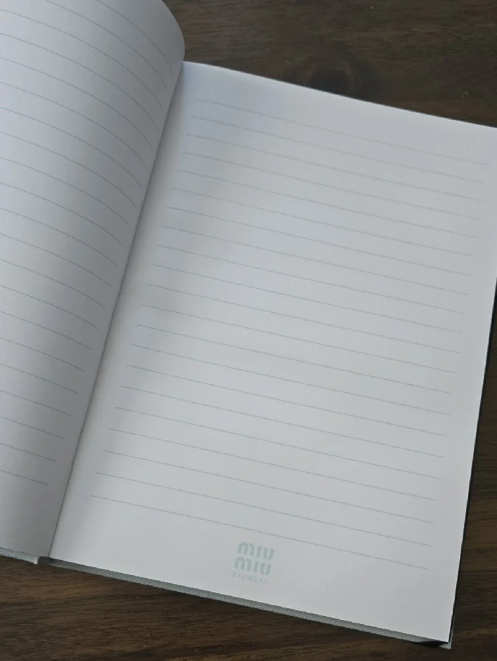 Miu Miu Light Gray Hardcover Notebook with Black Elastic